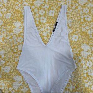 Deep V neck white bodysuit
